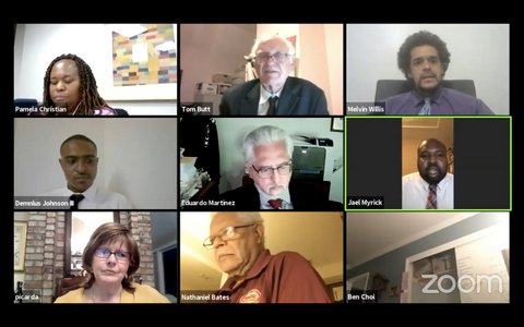 Screenshot of Zoom meeting showing eight people.