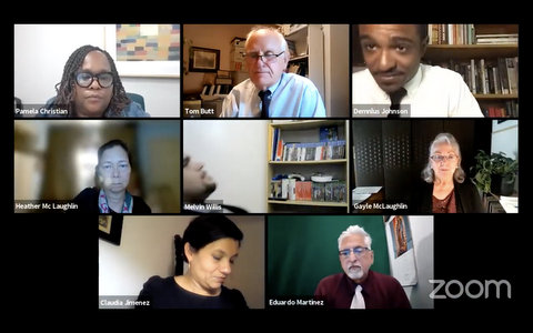 Eight people on Zoom in a virtual meeting