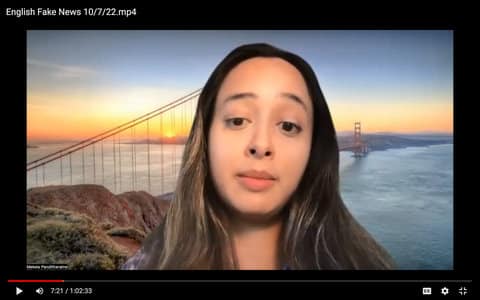 Screenshot of a young woman in front of a virtual background showing the Golden Gate Bridge and San Francisco Bay