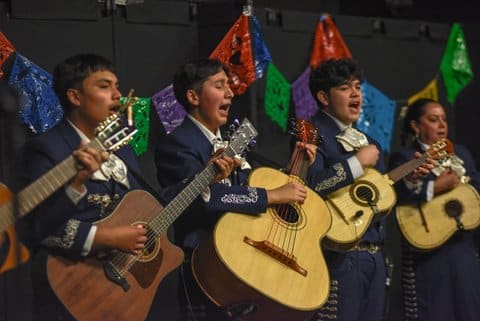 Mariachi musicians perform