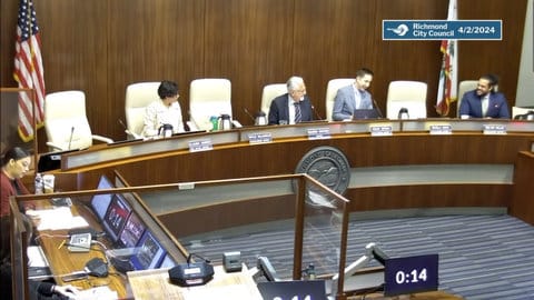 Screenshot from Richmond City Council meeting showing multiple members absent and some others laughing