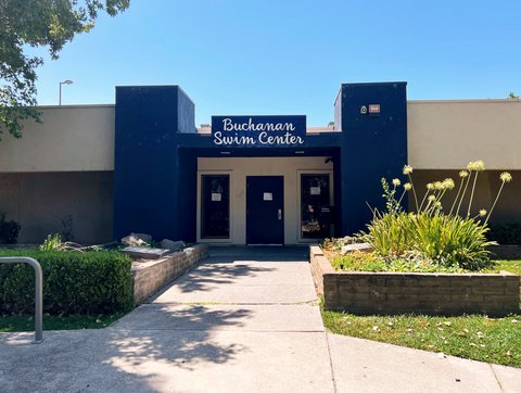 exterior of a building with sign that says buchanan swim center