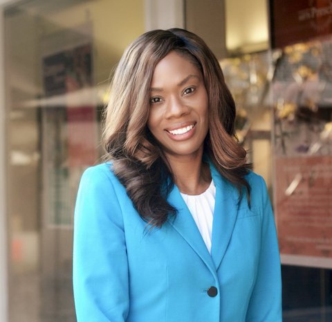 a smiling black woman