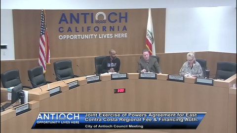 black man, white man and white woman in city council chambers with US and california flags behind them. text reads antioch opportunity lives here. joint exercise of powers agreement for east contra costa regional fee and financing auth. city of antioch council meeting