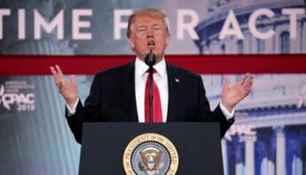 ‘America as We Knew it’—Ethnic Media on Trump’s First Week in Office donald trump at a lectern with the president of the united states seal