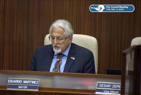richmond city council meeting, tuesday, december 2, 2025. latino man in suit with gray hair and goatee. name plate says eduardo martinez mayor