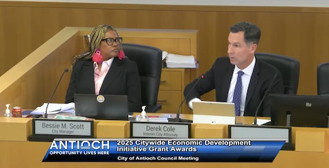 black woman with nameplate that reads bessie M scott city manager, white man with nameplate that reads derek cole interim city attorney, and text that reads antioch opportunity lives here 2025 citywide economic development initiative grant awards city of antioch council meeting