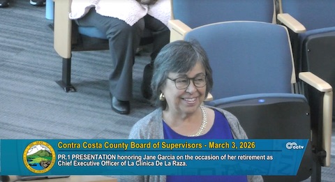 a latina woman and text that reads contra costa county board of supervisors march 3 2026, presentation honoring jane garcia on the occasion of her retirement as chief executive officer of la clinica de raza